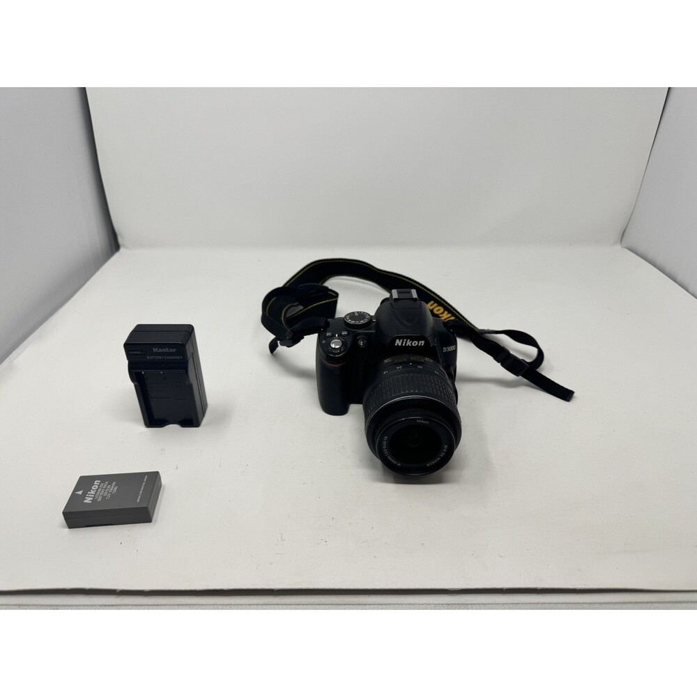 Nikon D3000 10.2MP DSLR Camera -Black-w/AF-S DX Nikkor 18-55mm 4-5.6G VR W/2GB